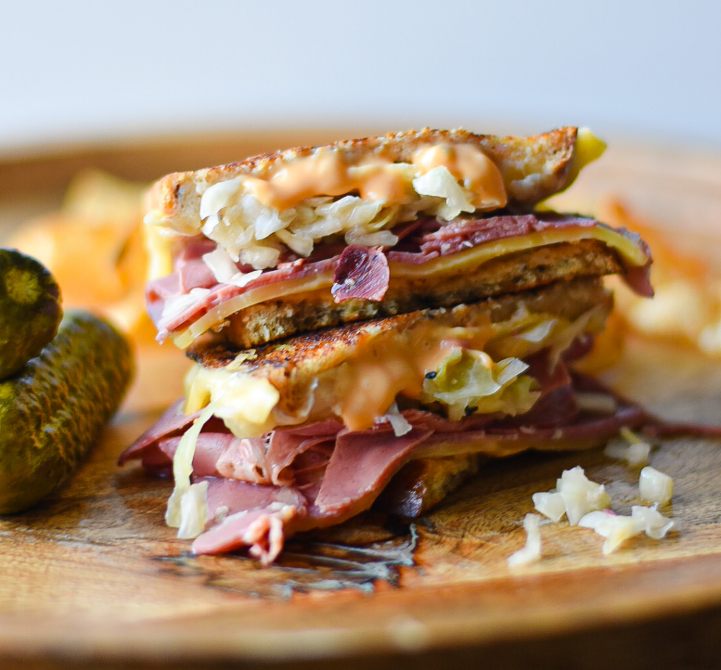 shows finished reuben sandwich with All-American Sandwich Spread